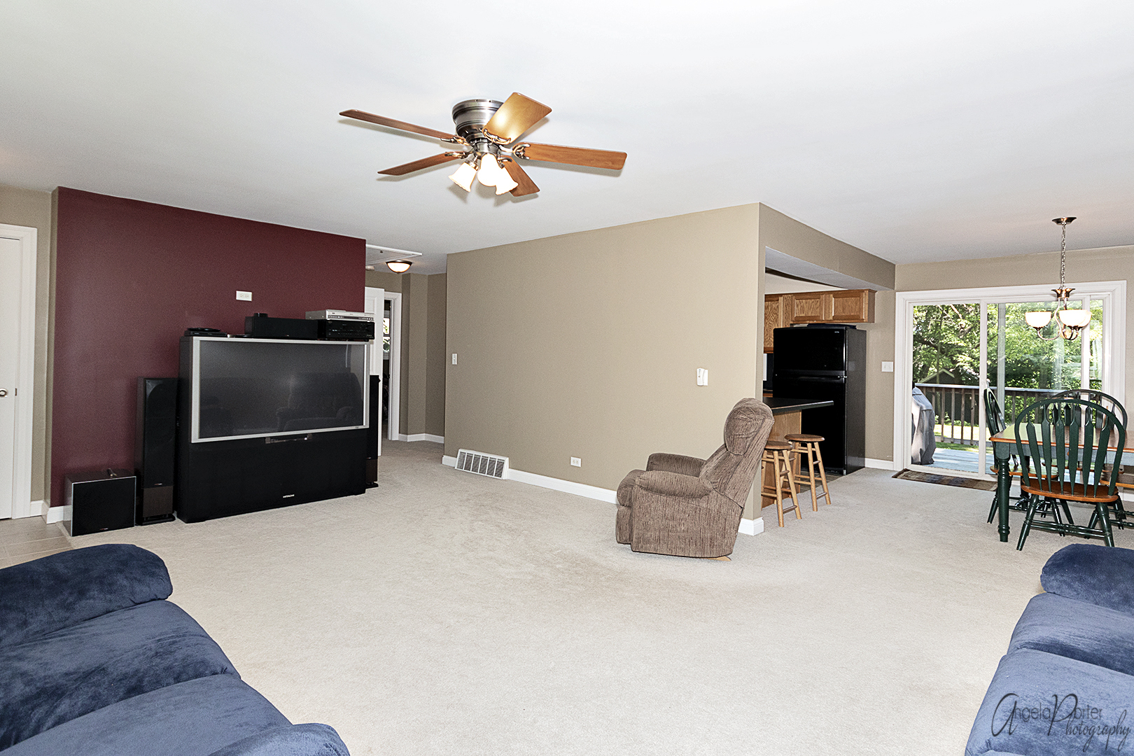 135 Eagle Point Road Fox Lake, IL 60020 - Photo 6 of 27 a bedroom with furniture and a flat screen tv
