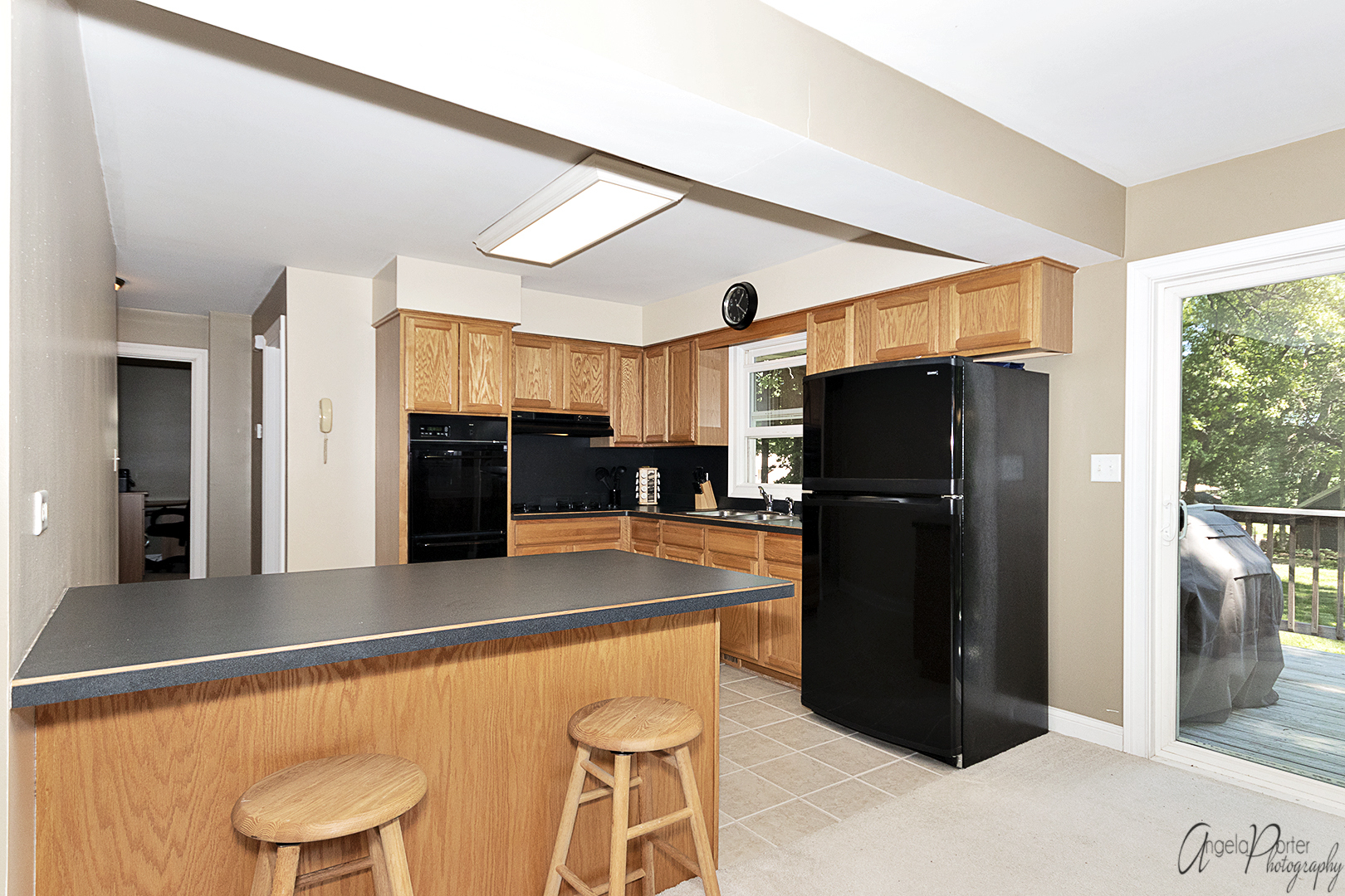 135 Eagle Point Road Fox Lake, IL 60020 - Photo 8 of 27 a kitchen with stainless steel appliances granite countertop a refrigerator and a stove top oven