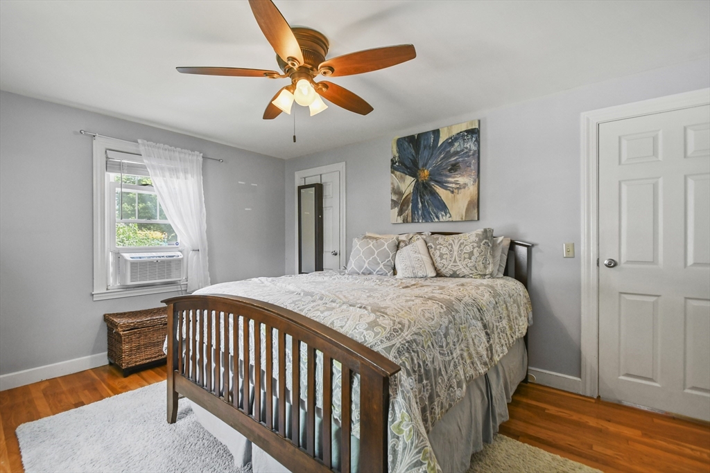 293 Harrington Way Worcester, MA 01604 - Photo 12 of 29 a bedroom with a bed and a window