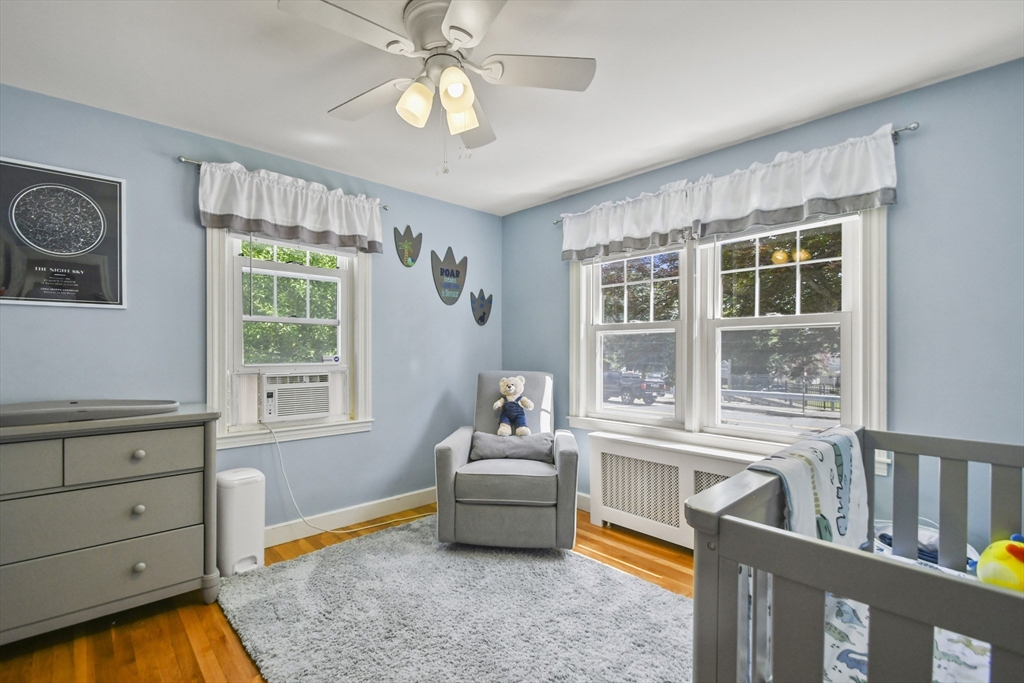 293 Harrington Way Worcester, MA 01604 - Photo 14 of 29 a bedroom with furniture and a window