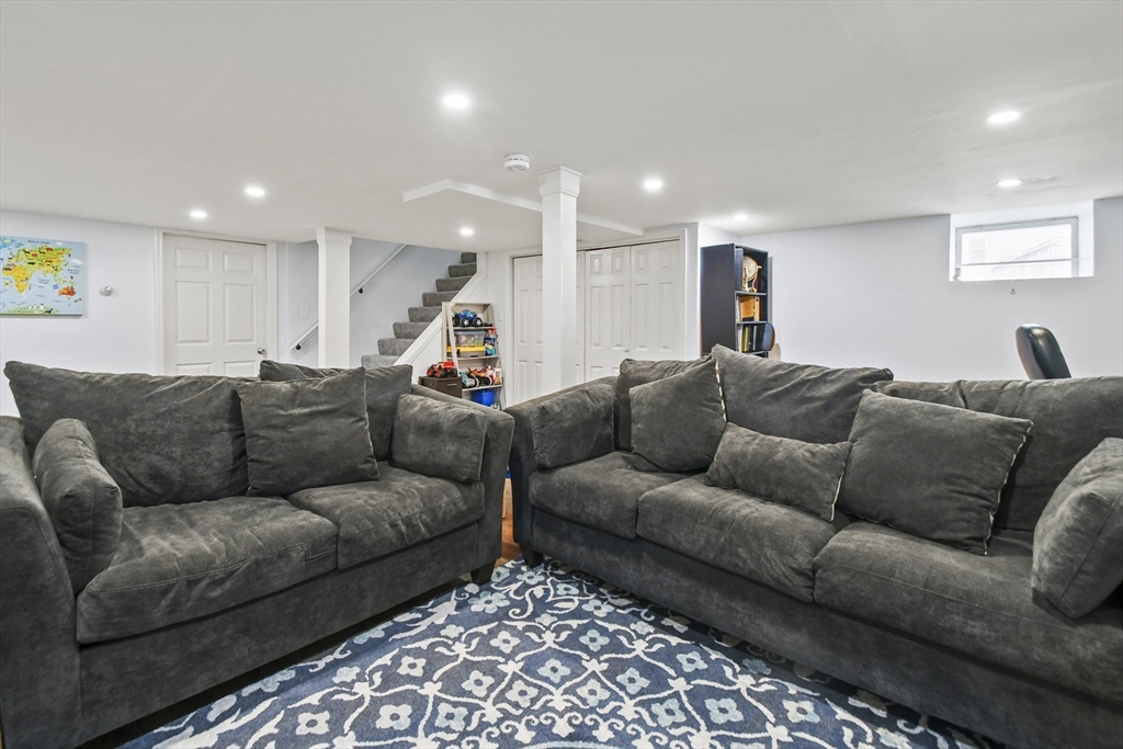 293 Harrington Way Worcester, MA 01604 - Photo 20 of 29 a living room with a couch and a couch