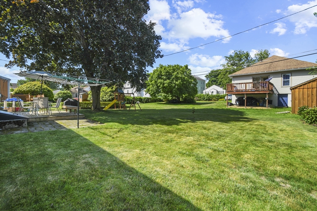 293 Harrington Way Worcester, MA 01604 - Photo 28 of 29 a view of a house with a big yard