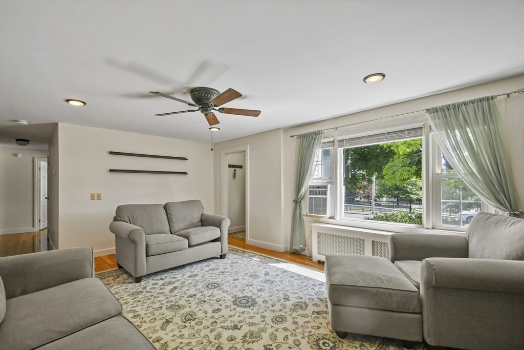 293 Harrington Way Worcester, MA 01604 - Photo 3 of 29 a living room with furniture and a large window
