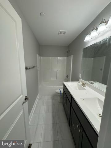 1095 Llano Drive La Plata, MD 20646 - Photo 11 of 19 a bathroom with a sink a toilet and a mirror