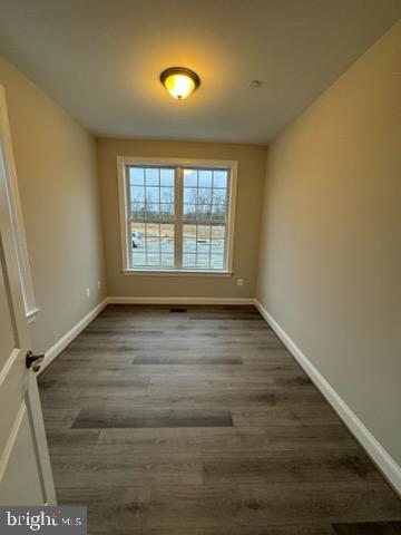 1095 Llano Drive La Plata, MD 20646 - Photo 15 of 19 a view of an empty room with a window and wooden floor