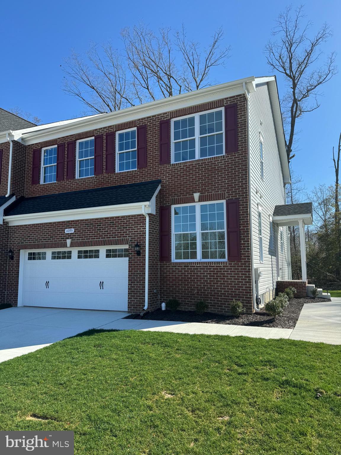 1095 Llano Drive La Plata, MD 20646 - Photo 2 of 19 a front view of a house with a yard