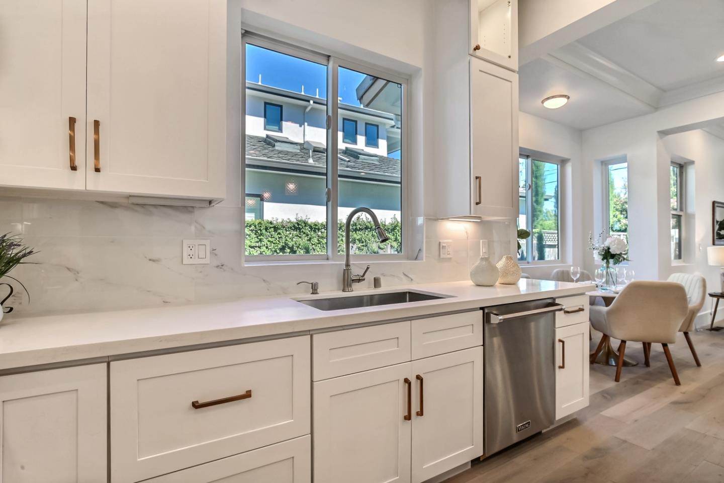 10732 Culbertson Drive Cupertino, CA 95014 - Photo 11 of 36 a kitchen with a sink and cabinets