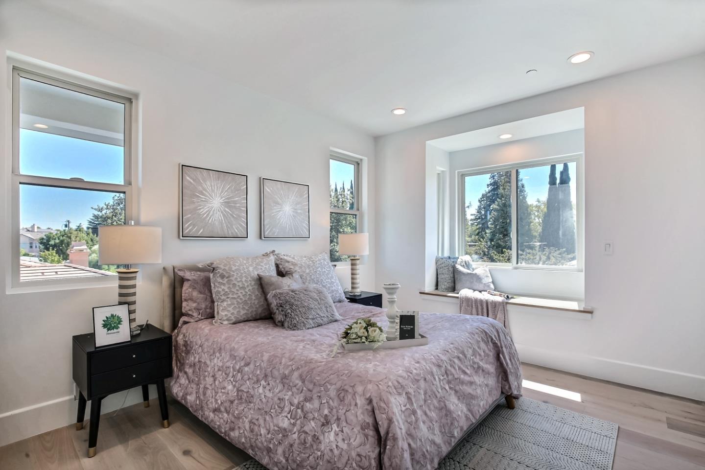 10732 Culbertson Drive Cupertino, CA 95014 - Photo 23 of 36 a bedroom with a bed and wooden floor