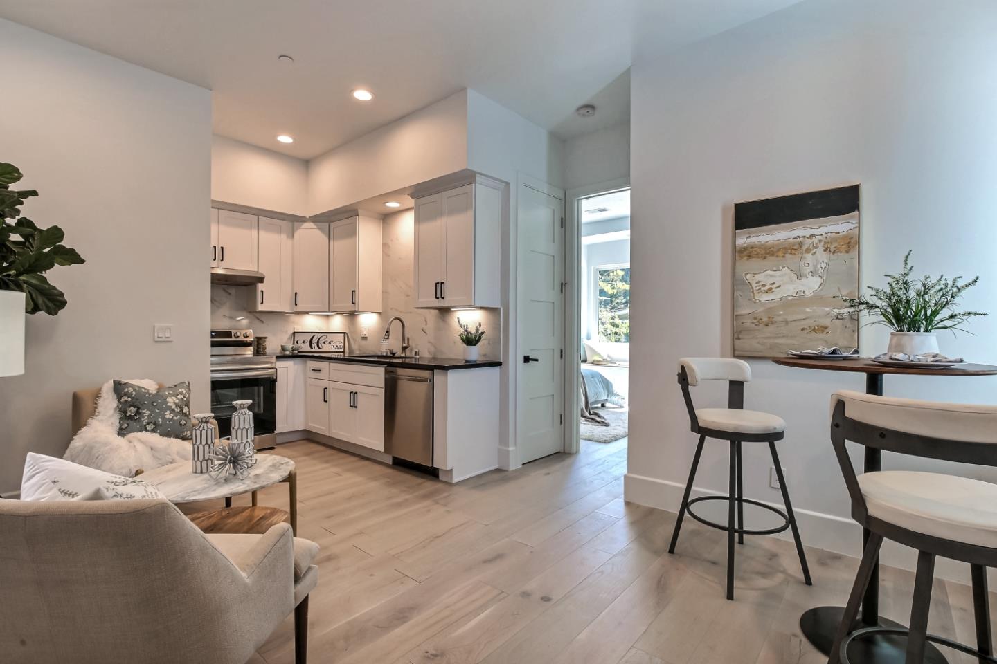 10732 Culbertson Drive Cupertino, CA 95014 - Photo 32 of 36 a living room with stainless steel appliances kitchen island granite countertop furniture and a kitchen view