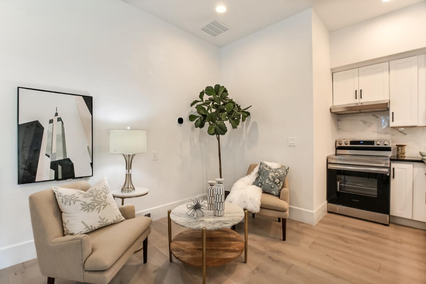 10732 Culbertson Drive Cupertino, CA 95014 - Photo 33 of 36 a living room with furniture and a fireplace