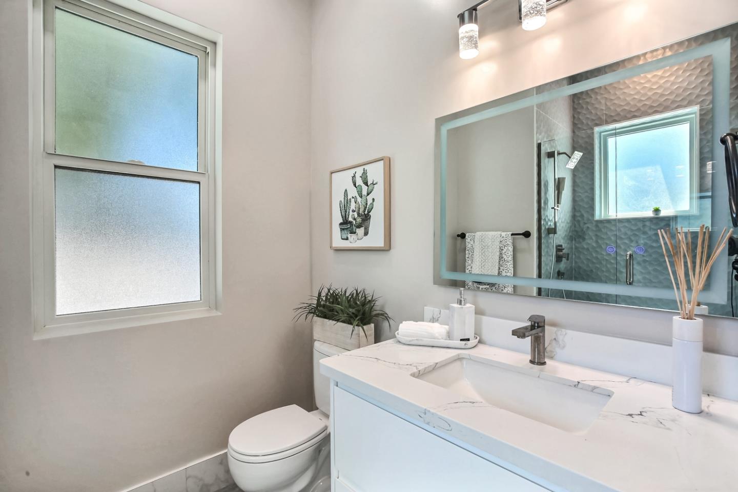 10732 Culbertson Drive Cupertino, CA 95014 - Photo 36 of 36 a bathroom with a sink toilet and vanity