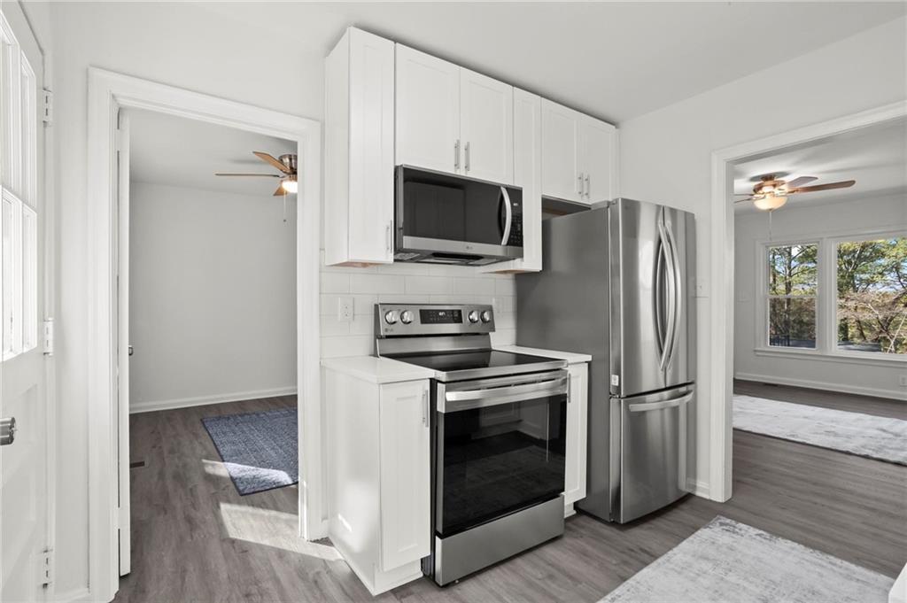 502 Alpine Way Marietta, GA 30062 - Photo 13 of 21 a kitchen with a refrigerator stove and microwave