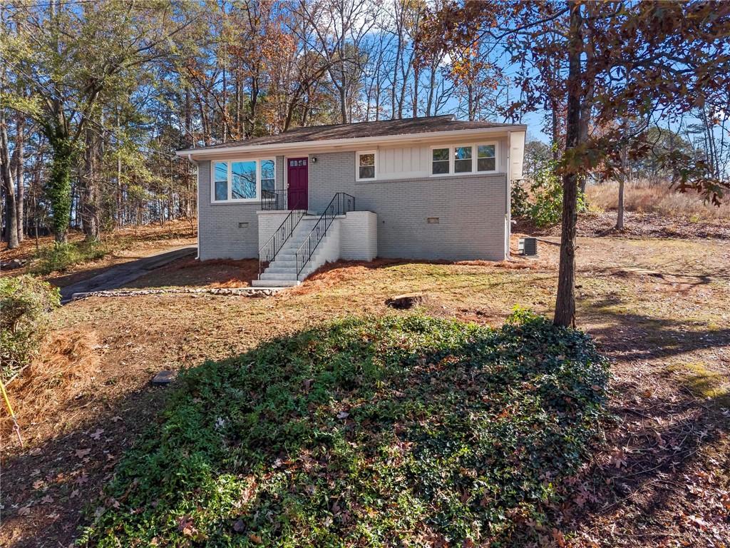 502 Alpine Way Marietta, GA 30062 - Photo 21 of 21 a view of a house with a yard covered in snow