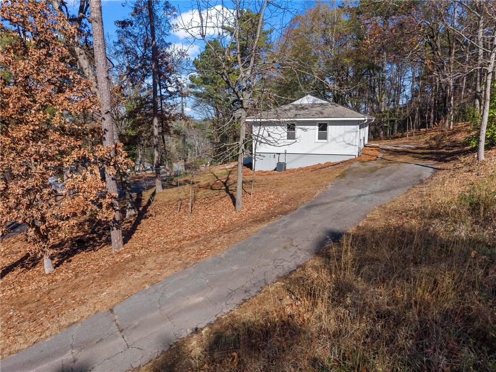 502 Alpine Way Marietta, GA 30062 - Photo 4 of 21 a front view of a house with a yard and garage