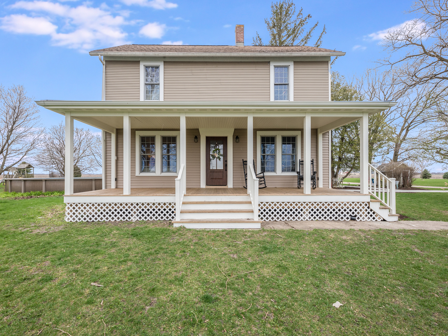 3185 South Hadden Road Verona, IL 60479 - Photo 1 of 39 a front view of a house with a garden