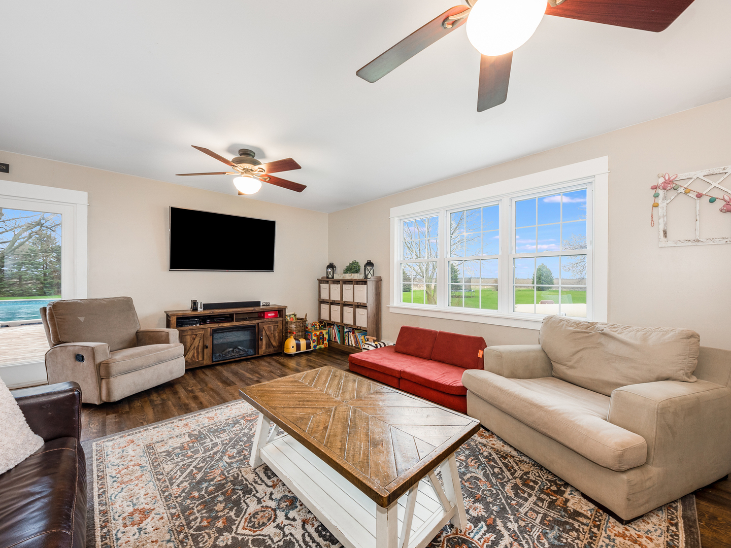 3185 South Hadden Road Verona, IL 60479 - Photo 13 of 39 a living room with furniture and a flat screen tv