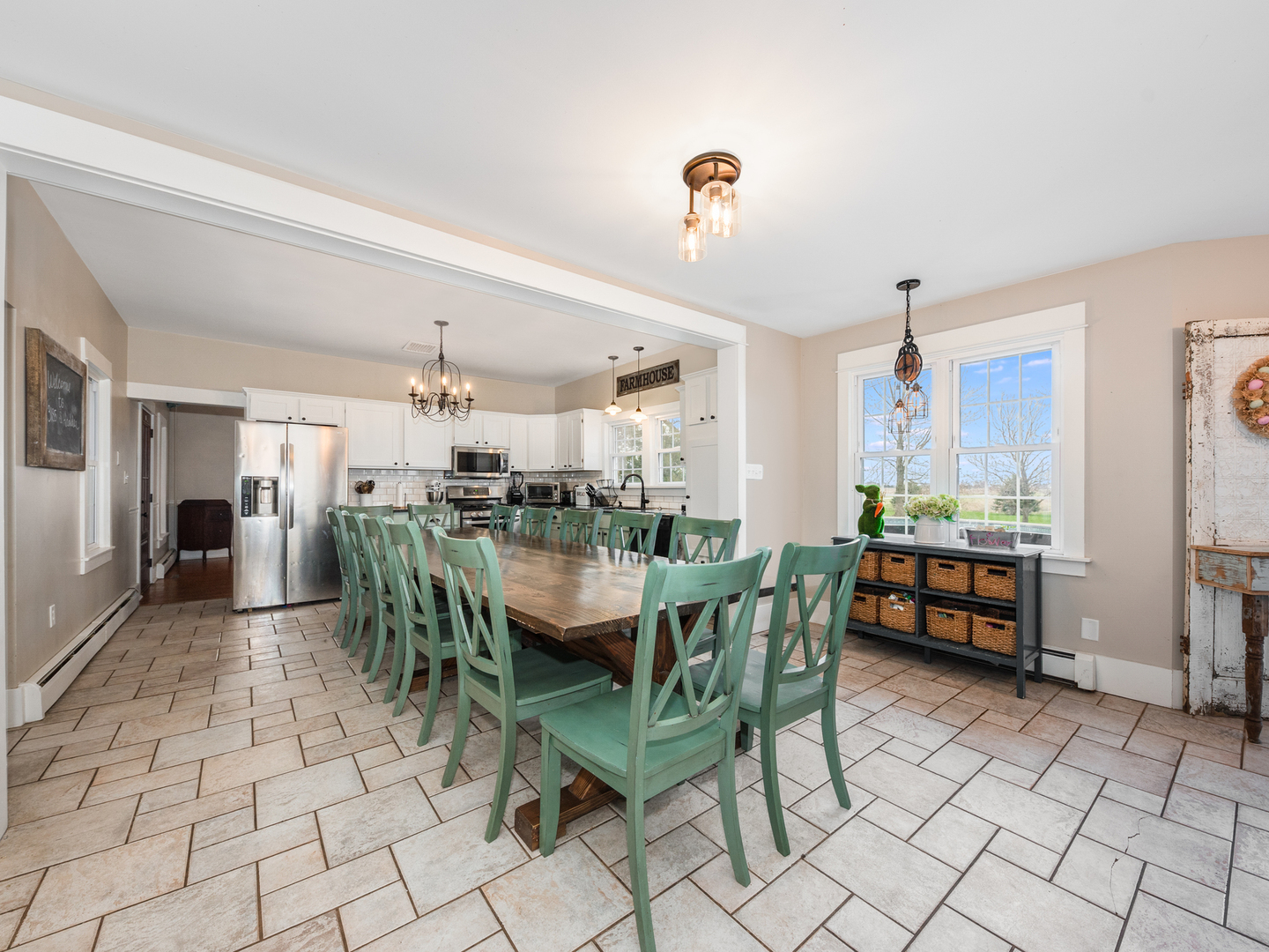 3185 South Hadden Road Verona, IL 60479 - Photo 14 of 39 a dining hall with stainless steel appliances kitchen island granite countertop a table and chairs in it