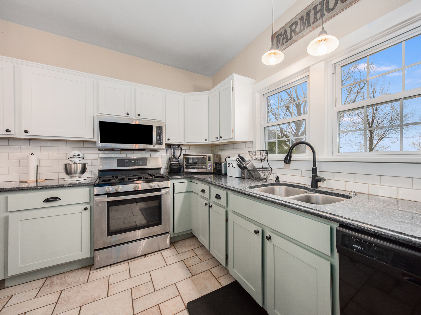 3185 South Hadden Road Verona, IL 60479 - Photo 16 of 39 a kitchen with stainless steel appliances granite countertop a sink and dishwasher a stove top oven with white cabinets