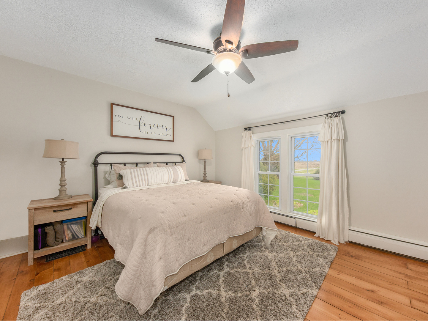 3185 South Hadden Road Verona, IL 60479 - Photo 20 of 39 a bedroom with a bed a ceiling fan and a large window