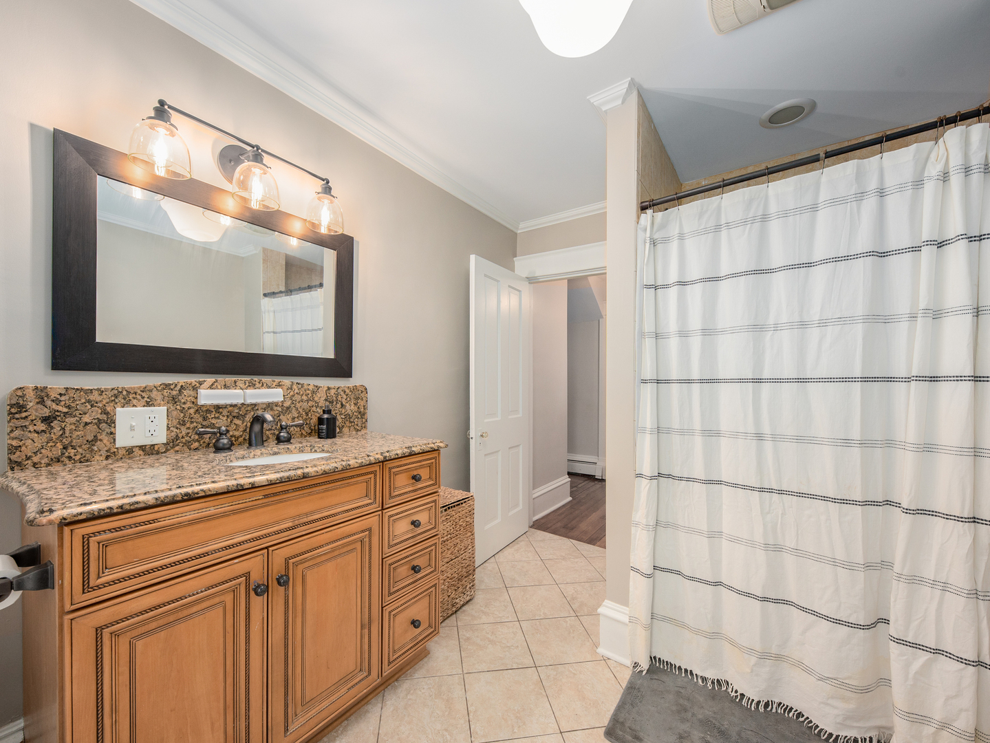 3185 South Hadden Road Verona, IL 60479 - Photo 24 of 39 a bathroom with a double vanity sink mirror and shower