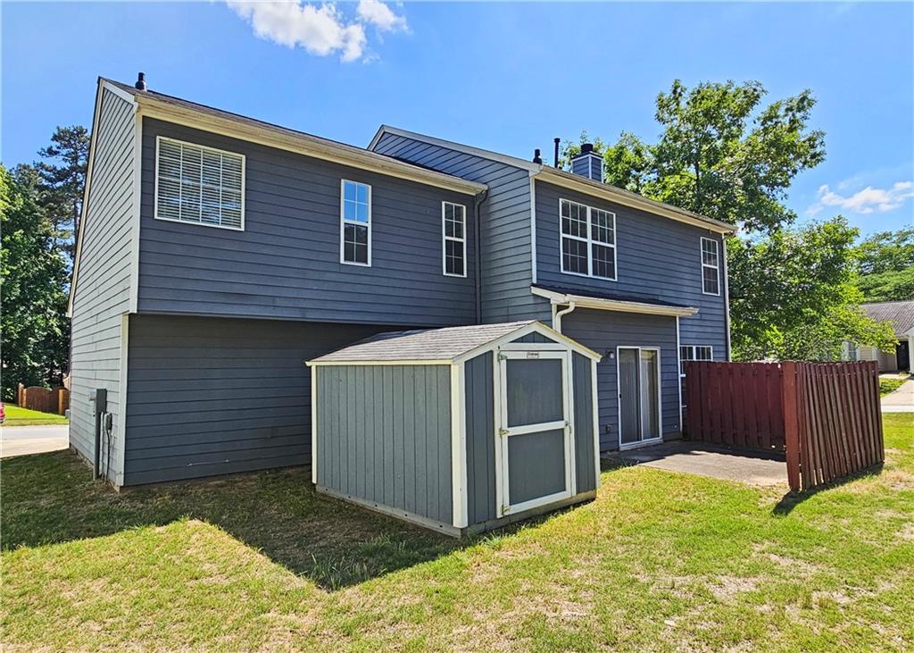 1334 Ambercrest Way Austell, GA 30168 - Photo 20 of 20 a front view of a house with a yard