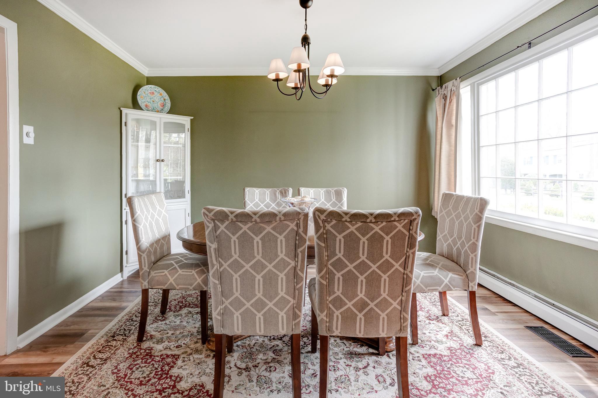 248 Arlingham Road Flourtown, PA 19031 - Photo 13 of 38 a view of a dining room with furniture window and wooden floor