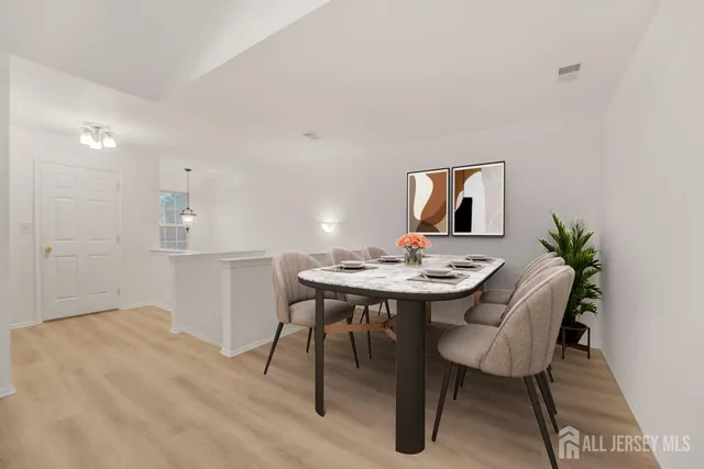 a view of a dining room with furniture