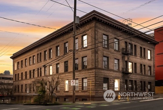 a front view of a building with lot of windows
