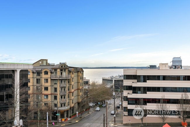 22 John Street, Unit 6 Seattle, WA 98109 - Photo 16 of 17 a view of a building with a bench