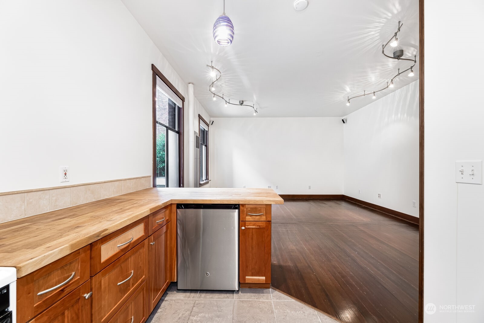 22 John Street, Unit 6 Seattle, WA 98109 - Photo 10 of 17 a view of cabinets and wooden floor