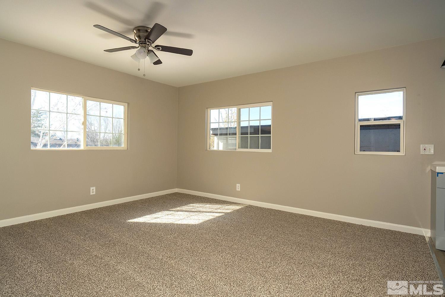 16310 Enargite Circle Reno, NV 89521 - Photo 12 of 32 a view of an empty room with a window
