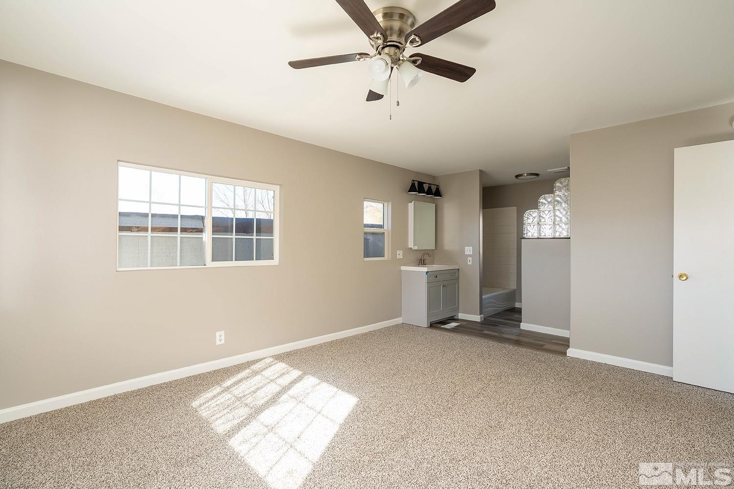 16310 Enargite Circle Reno, NV 89521 - Photo 13 of 32 a view of an empty room with a window