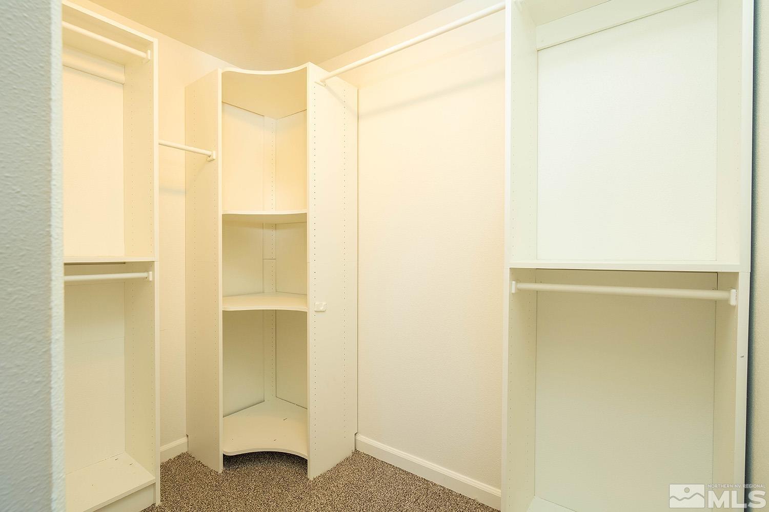 16310 Enargite Circle Reno, NV 89521 - Photo 15 of 32 a bathroom with a shower and a glass door