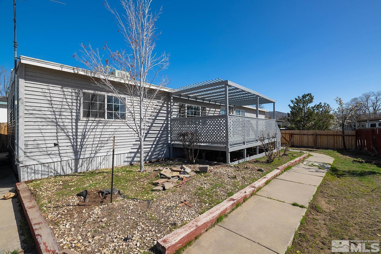 16310 Enargite Circle Reno, NV 89521 - Photo 21 of 32 a view of house with a backyard