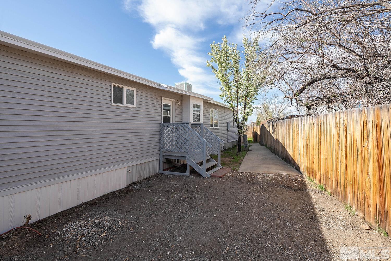 16310 Enargite Circle Reno, NV 89521 - Photo 25 of 32 a view of a house with a yard