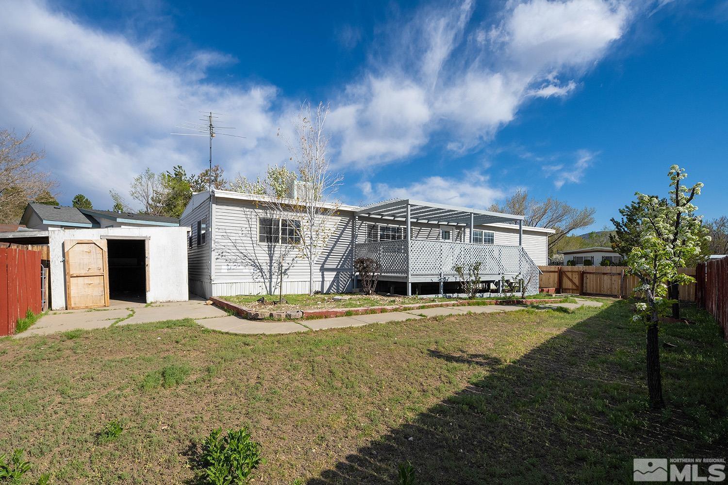 16310 Enargite Circle Reno, NV 89521 - Photo 26 of 32 a view of a house with backyard and sitting area