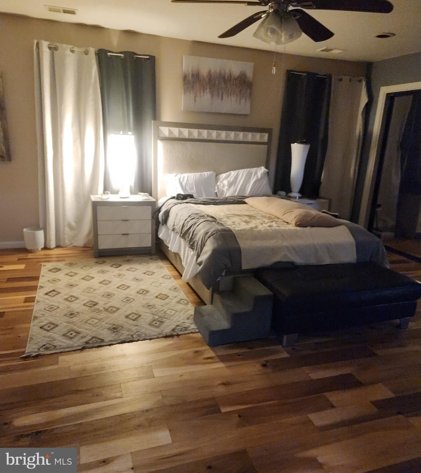 6810 Robinia Road Temple Hills, MD 20748 - Photo 14 of 15 a bedroom with a bed and a window