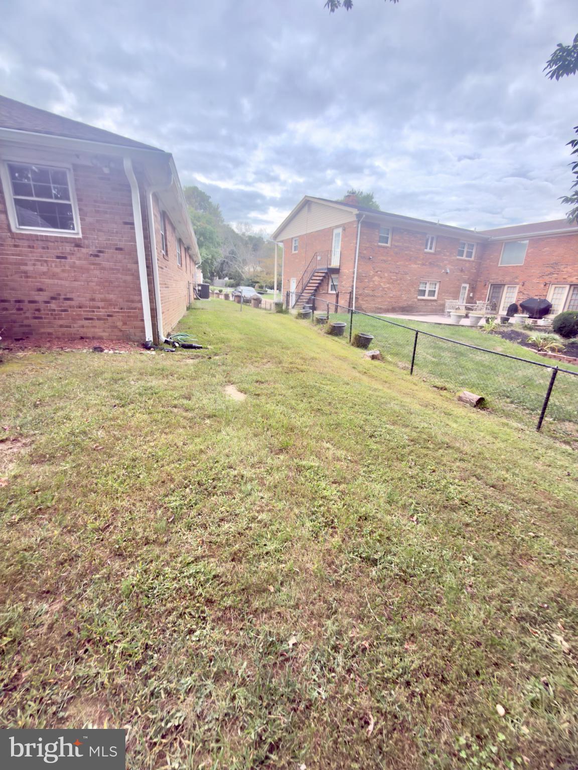 6810 Robinia Road Temple Hills, MD 20748 - Photo 2 of 15 a building with trees in front of it