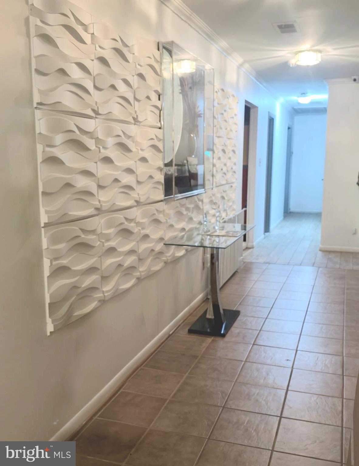 6810 Robinia Road Temple Hills, MD 20748 - Photo 5 of 15 a bathroom with a sink and a mirror