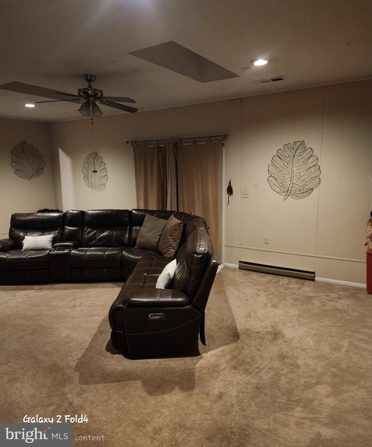 6810 Robinia Road Temple Hills, MD 20748 - Photo 7 of 15 a living room with furniture