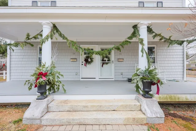 a kitchen with granite countertop a refrigerator and a sink