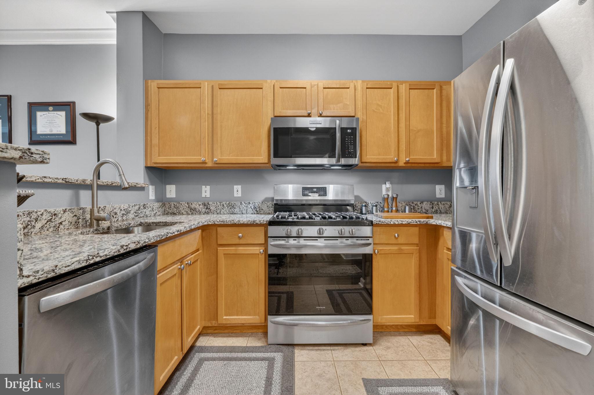 12000 Market Street, Unit 266 Reston, VA 20190 - Photo 5 of 49 Updated kitchen