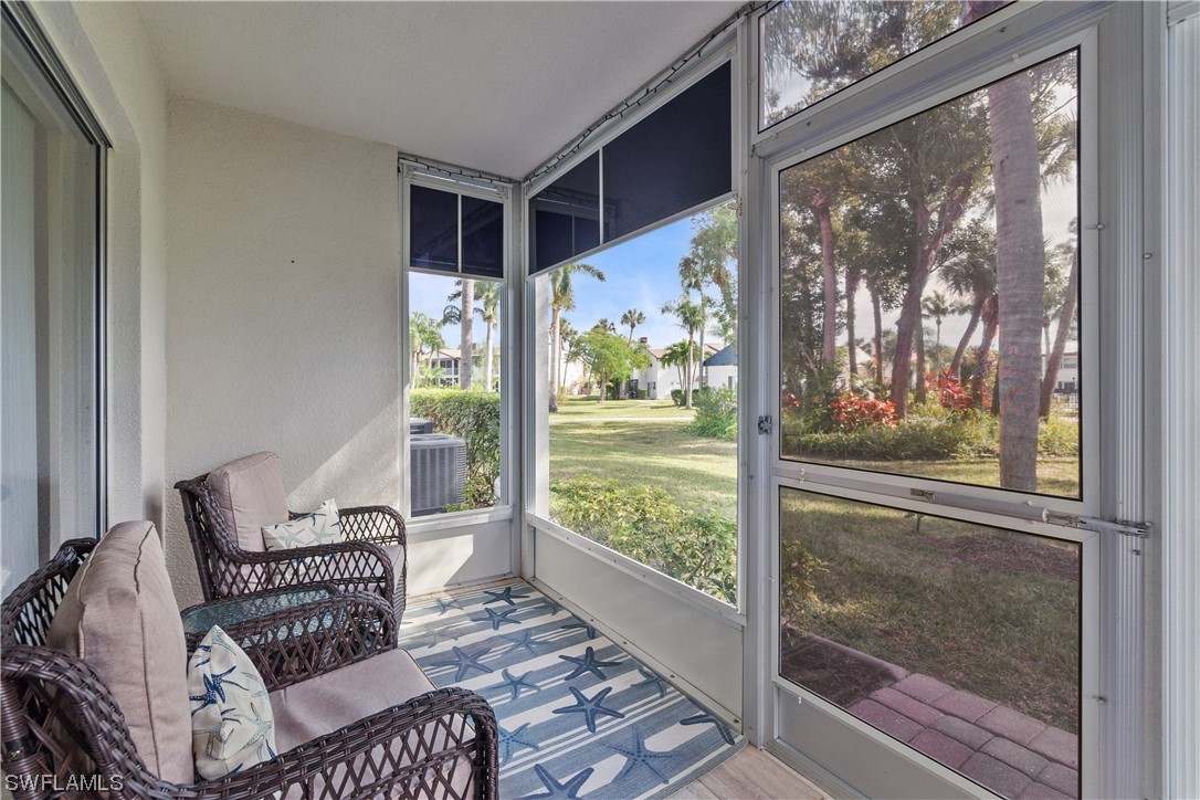 7031 New Post Road, Unit 4 North Fort Myers, FL 33917 - Photo 21 of 39 a living room with furniture