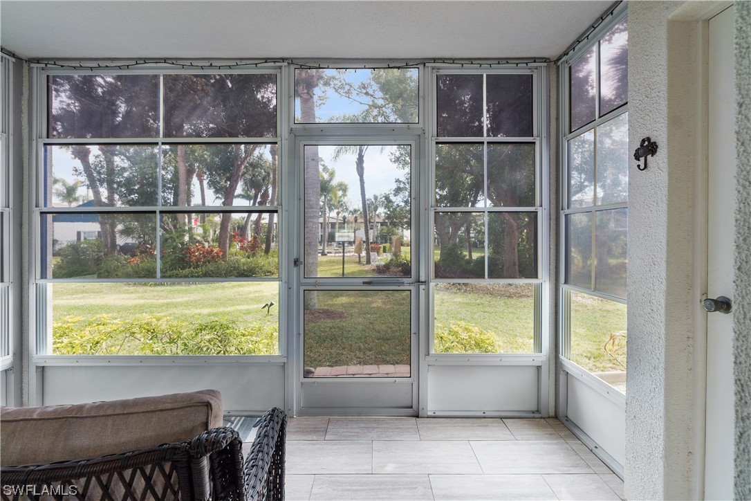 7031 New Post Road, Unit 4 North Fort Myers, FL 33917 - Photo 22 of 39 a bathroom with a tub