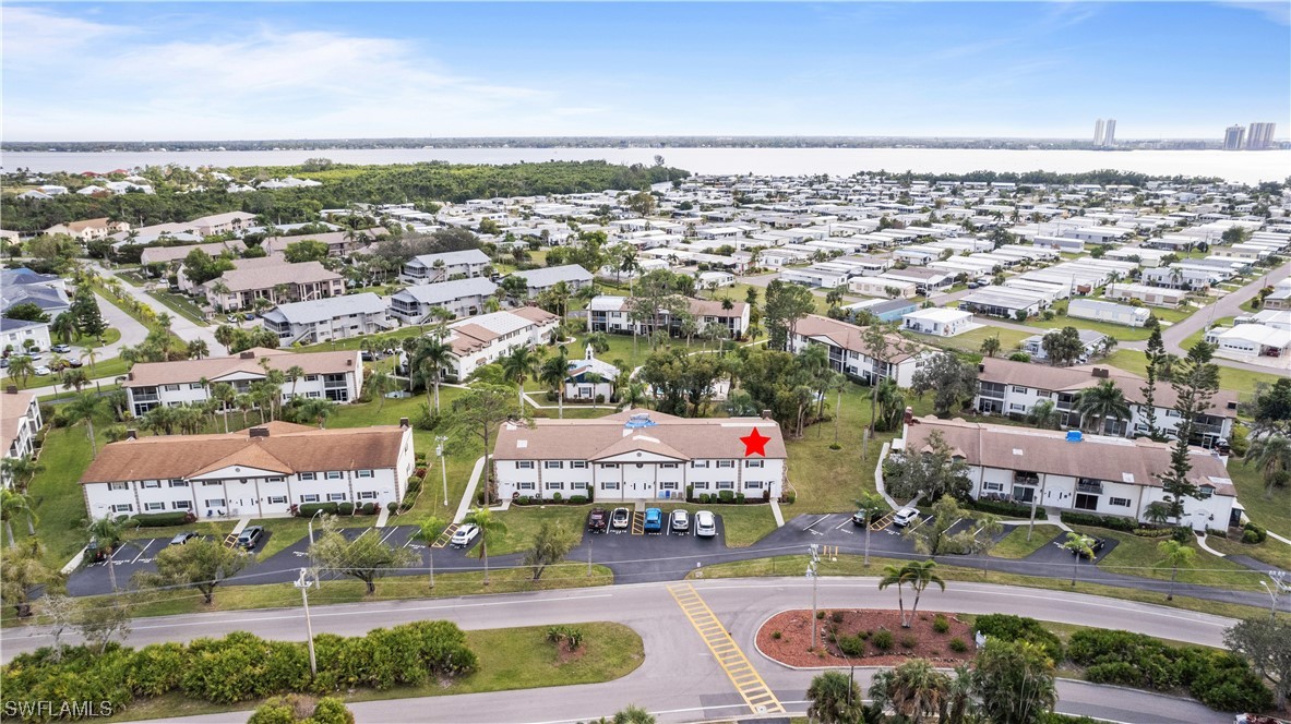 7031 New Post Road, Unit 4 North Fort Myers, FL 33917 - Photo 32 of 39 an aerial view of a city