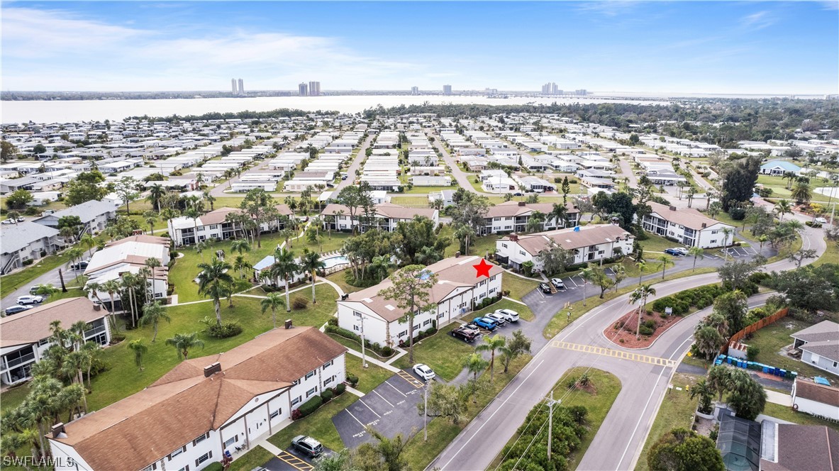 7031 New Post Road, Unit 4 North Fort Myers, FL 33917 - Photo 34 of 39 an aerial view of a city