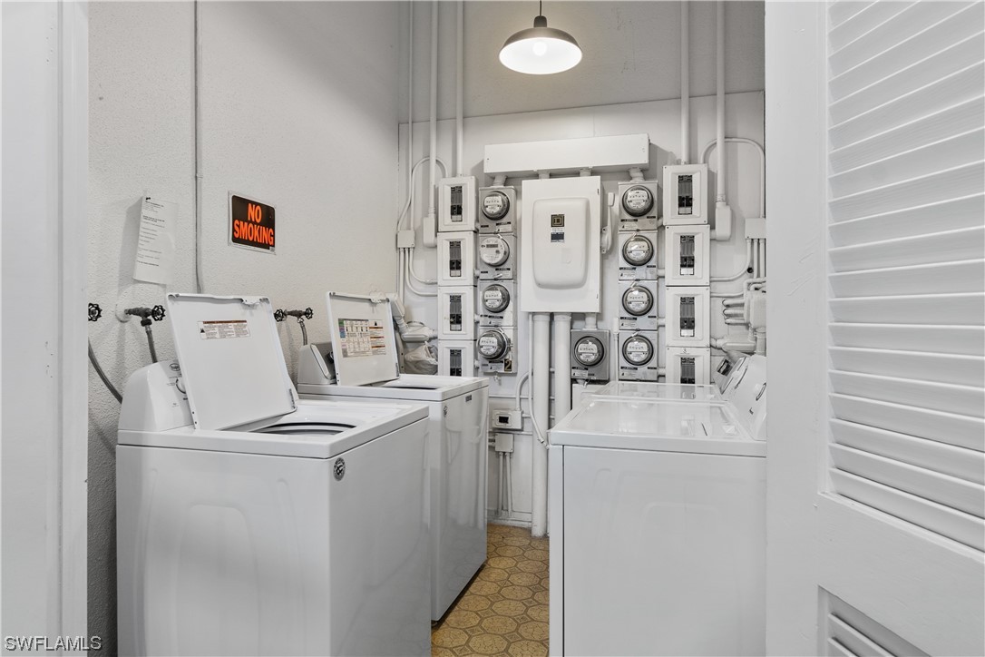 7031 New Post Road, Unit 4 North Fort Myers, FL 33917 - Photo 35 of 39 a utility room with dryer and washer