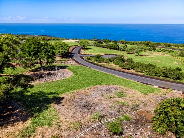 a view of street with ocean view