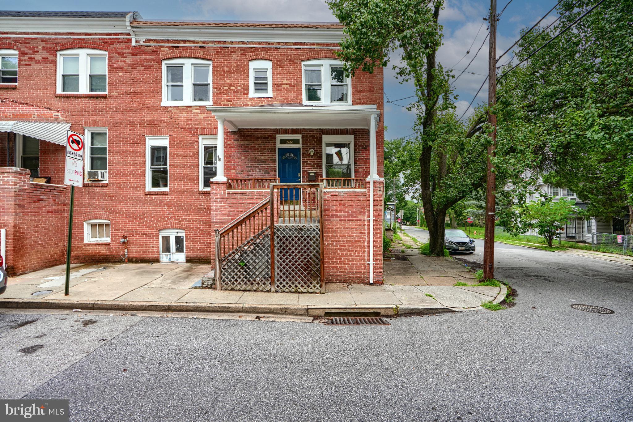 a front view of a house with a garage