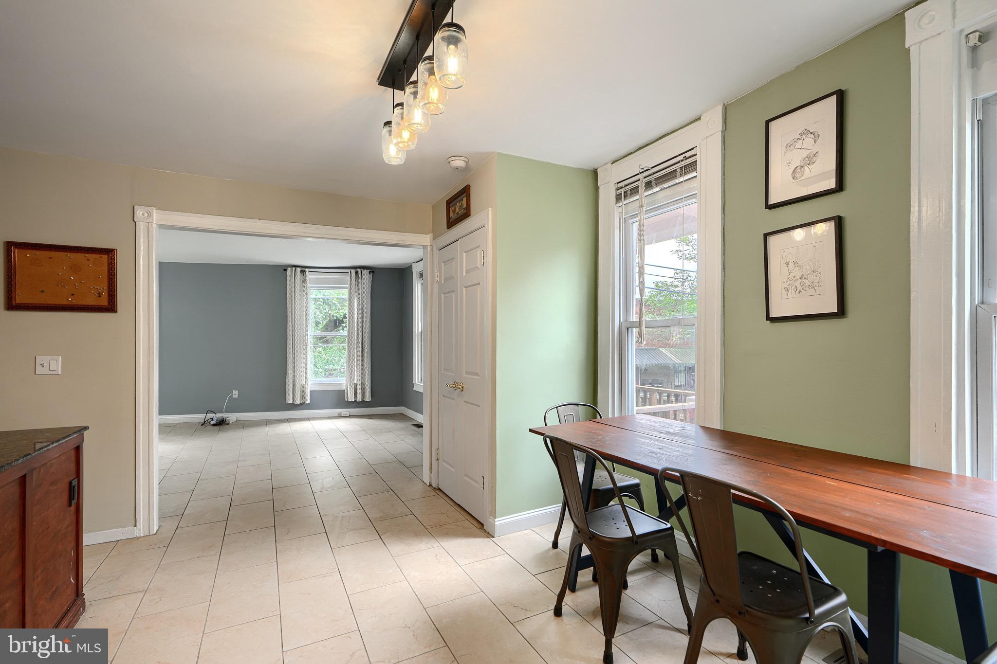 620 Montpelier Street, Unit 1 Baltimore, MD 21218 - Photo 15 of 29 a view of a livingroom with furniture and window
